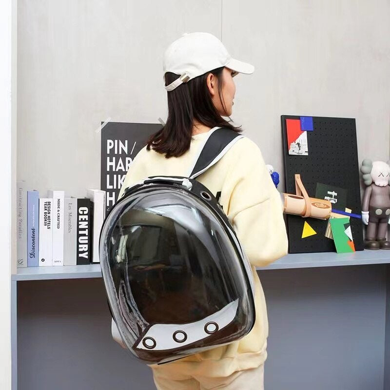 "Explore the Galaxy with Your Furry Friend: Astronaut-Inspired Transparent Backpack Pet Carrier for Dogs and Cats, Perfect for Travel!"