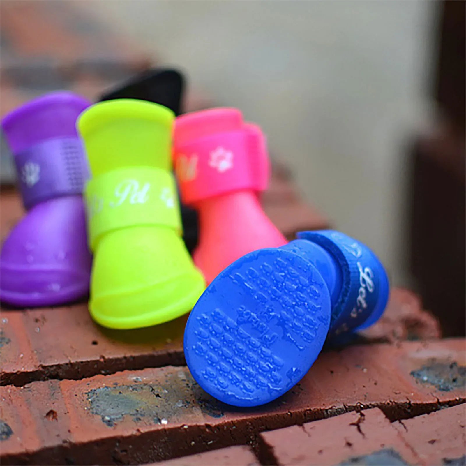 "Keep Your Pet's Paws Dry and Safe with our 4Pcs/Set Waterproof Anti-Slip Pet Rain Shoes - Perfect for Outdoor Adventures!"