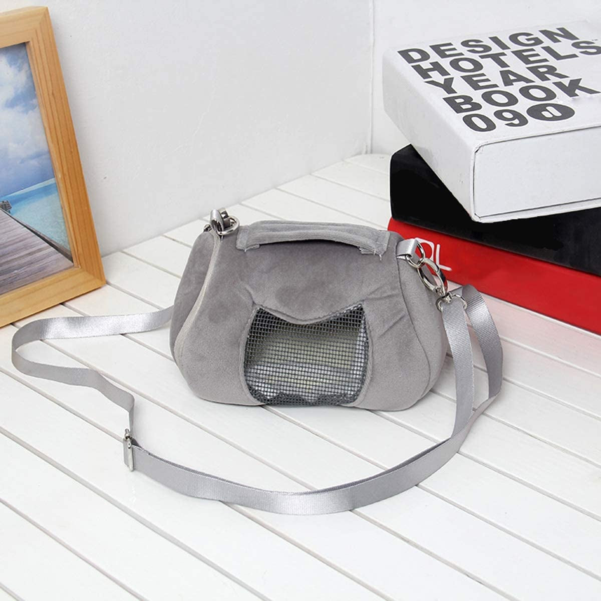 "Travel in Style with the Ultimate Hamster Carrier Bag - Portable, Adjustable, and Perfect for Small Pets!"