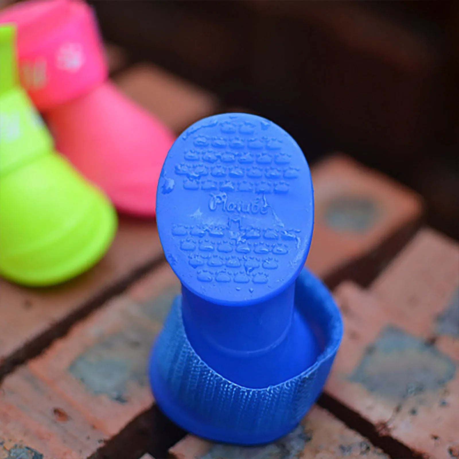 "Keep Your Pet's Paws Dry and Safe with our 4Pcs/Set Waterproof Anti-Slip Pet Rain Shoes - Perfect for Outdoor Adventures!"