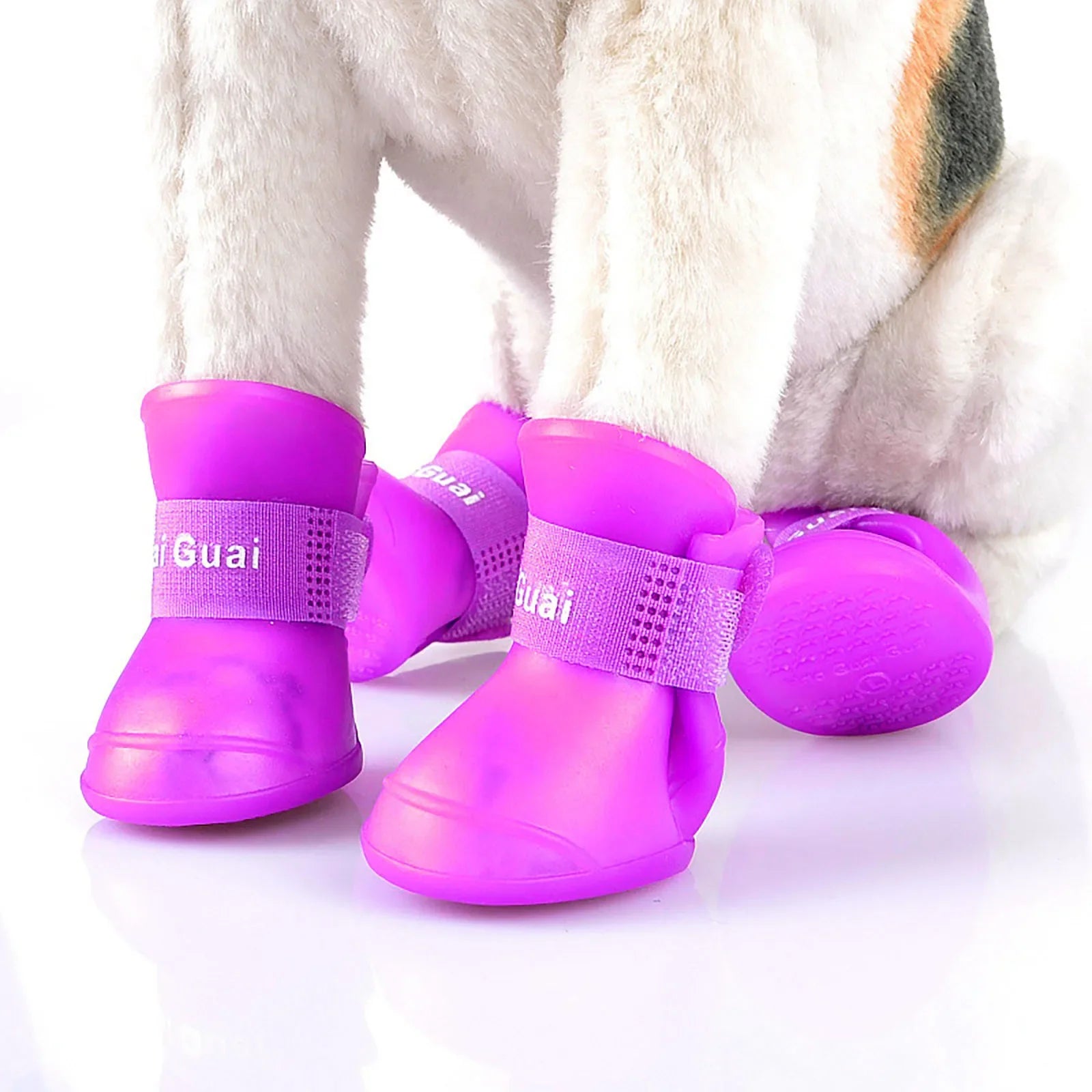 "Keep Your Pet's Paws Dry and Safe with our 4Pcs/Set Waterproof Anti-Slip Pet Rain Shoes - Perfect for Outdoor Adventures!"