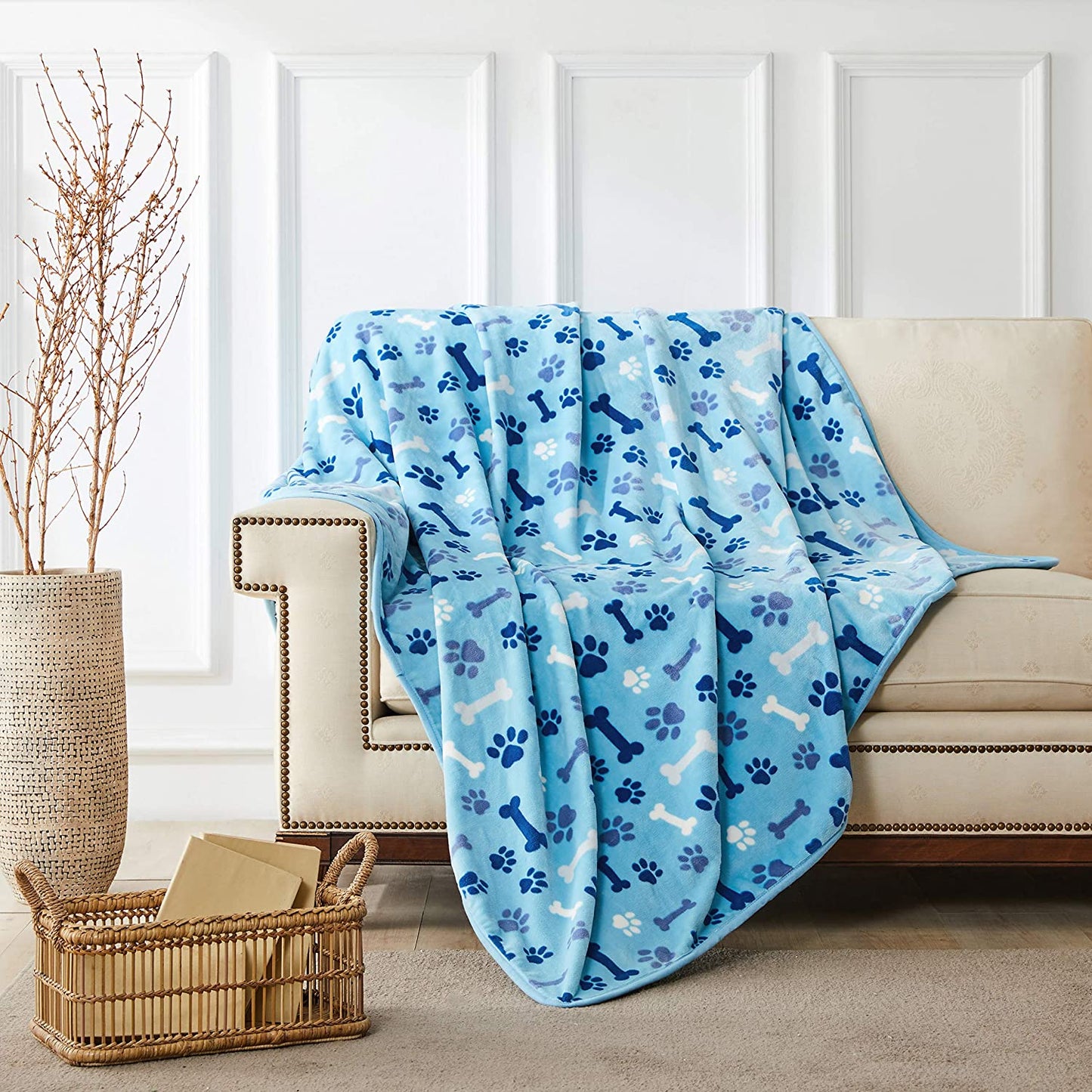 "Cozy and Stylish Blue Paw and Bone Dog Blanket - The Ultimate Luxury for Your Beloved Pet!"